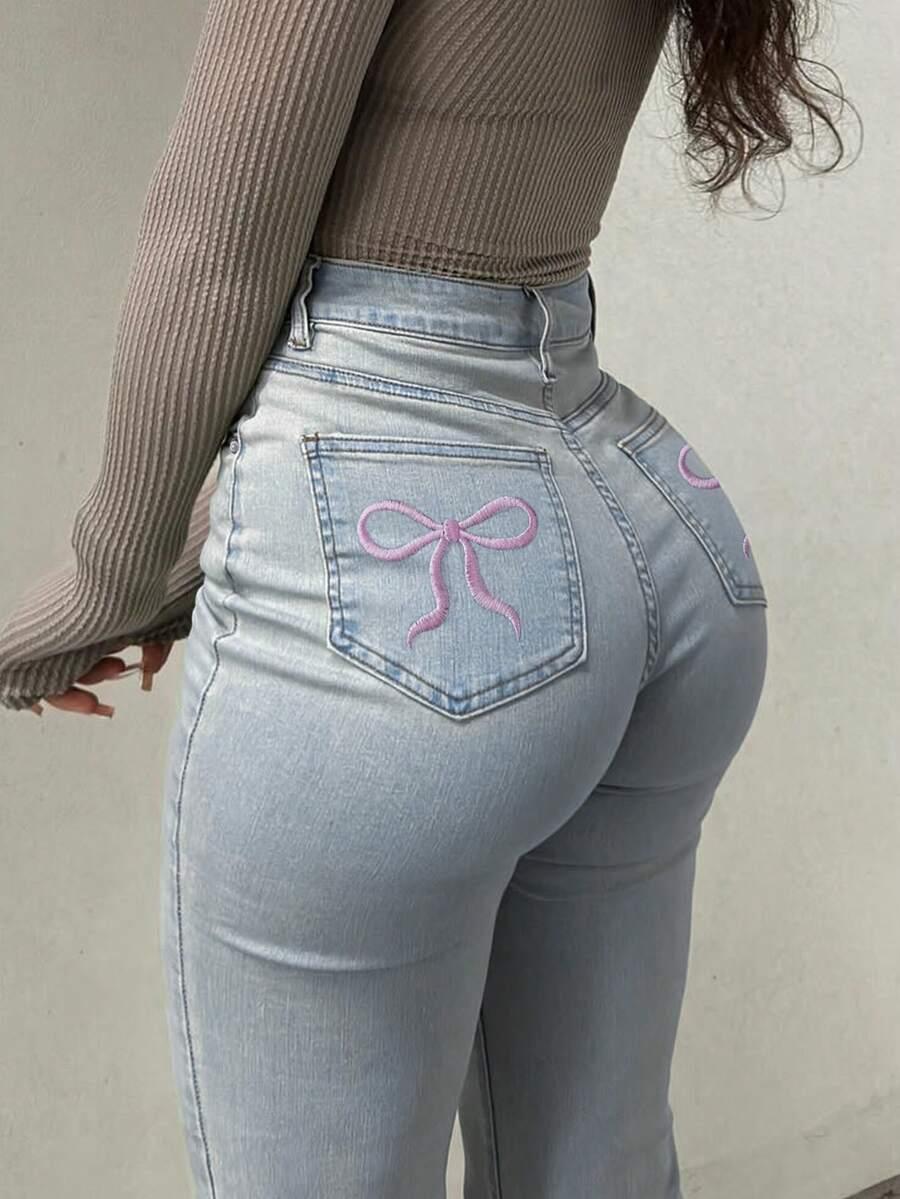 niebieskie jeansy dzwony kieszenie 