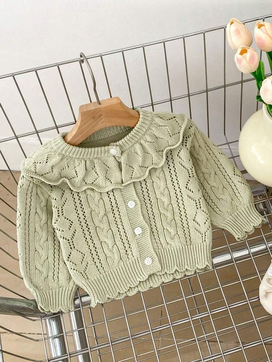 zielony sweter falbana 