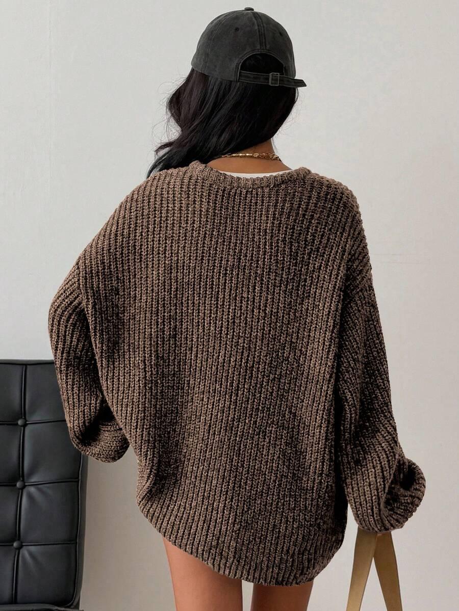 brązowy sweter zamek
