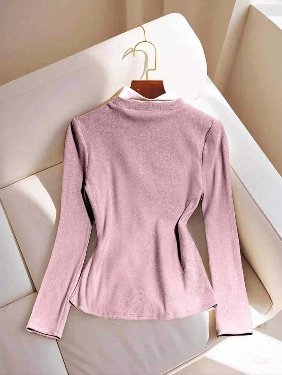RÓŻOWY SWETER GUZIKI