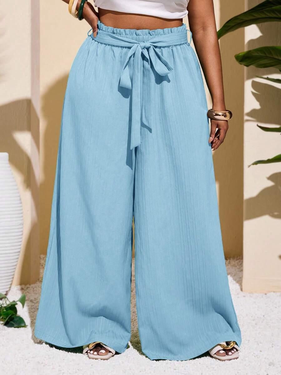 kremowe spodnie wide leg tekstura wysoki stan