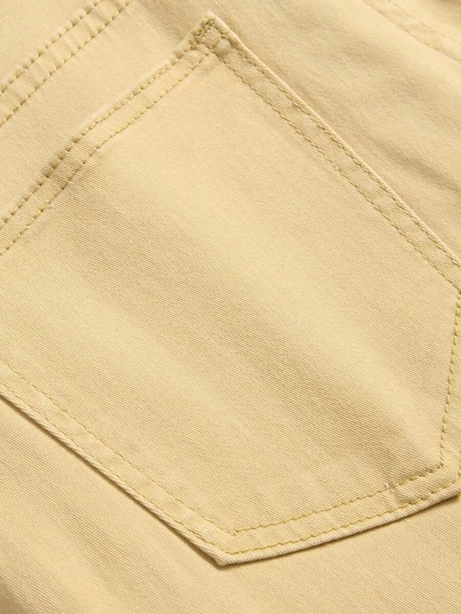zielone spodnie rurki jeans kieszenie zamek