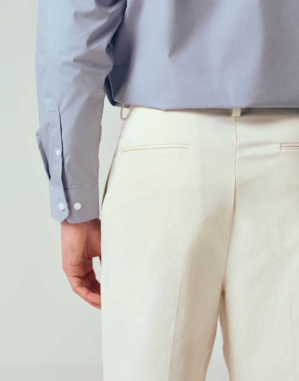 beżowe eleganckie spodnie kieszenie