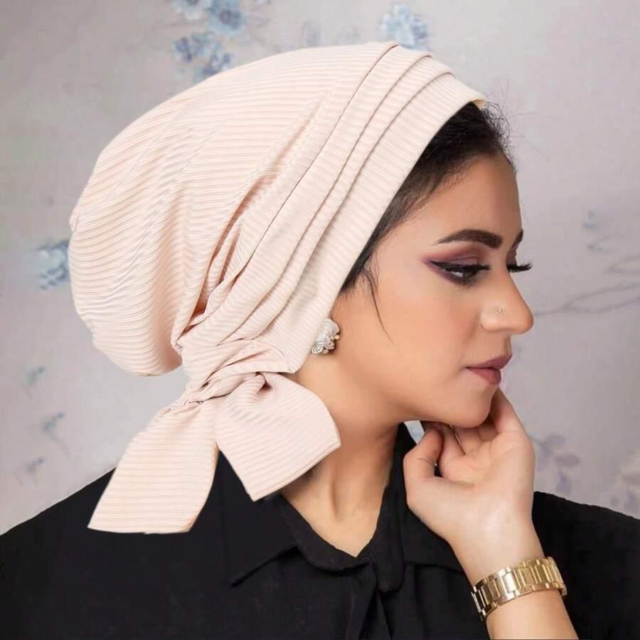 różowy turban wiązanie