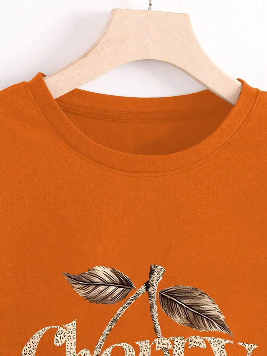 pomarańczowy t-shirt okrągły dekolt nadruk