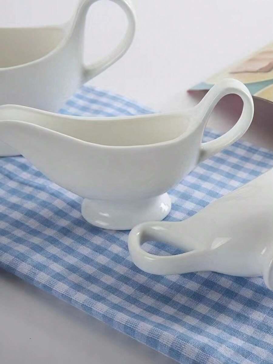 biała ceramiczna sosjerka
