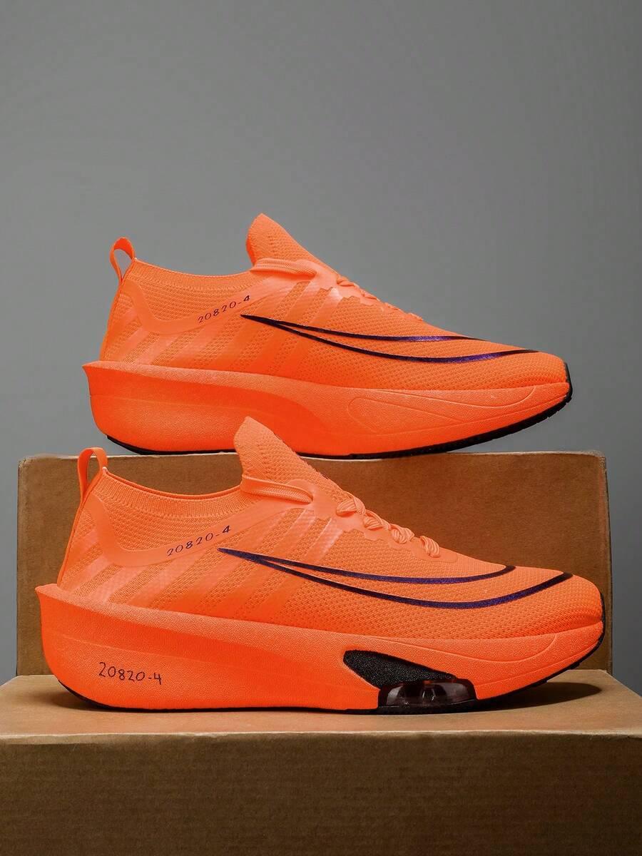 pomarańczowe buty sportowe