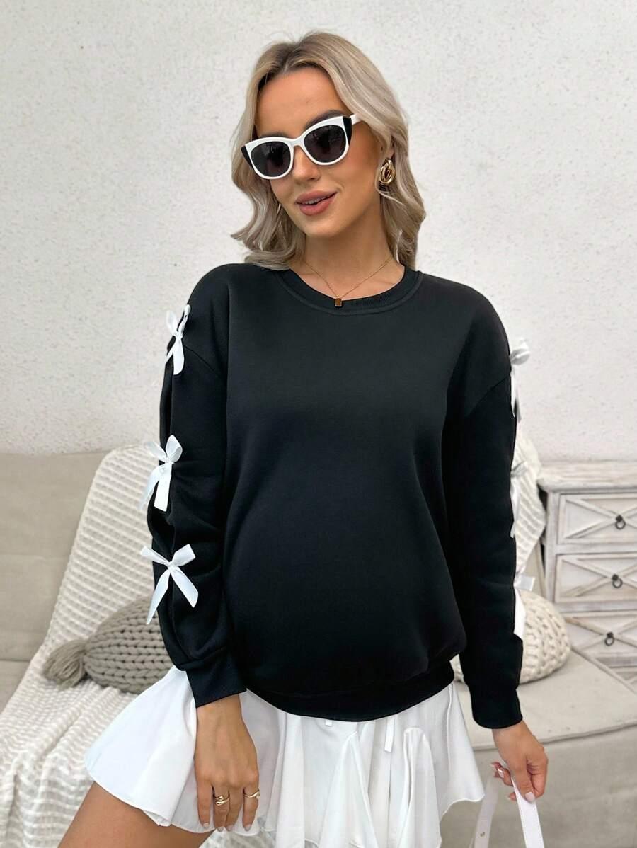 czarna bluza kokardy