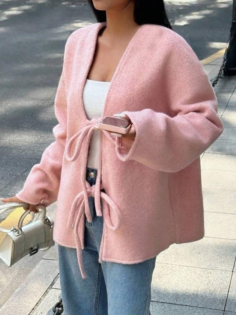 różowy sweter wiązanie