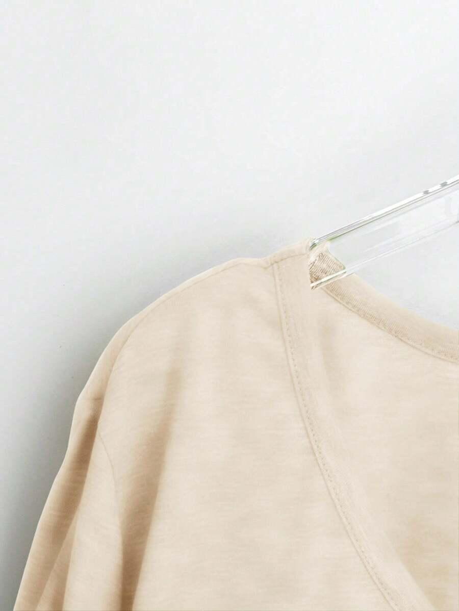 kremowa bluzka v-neck