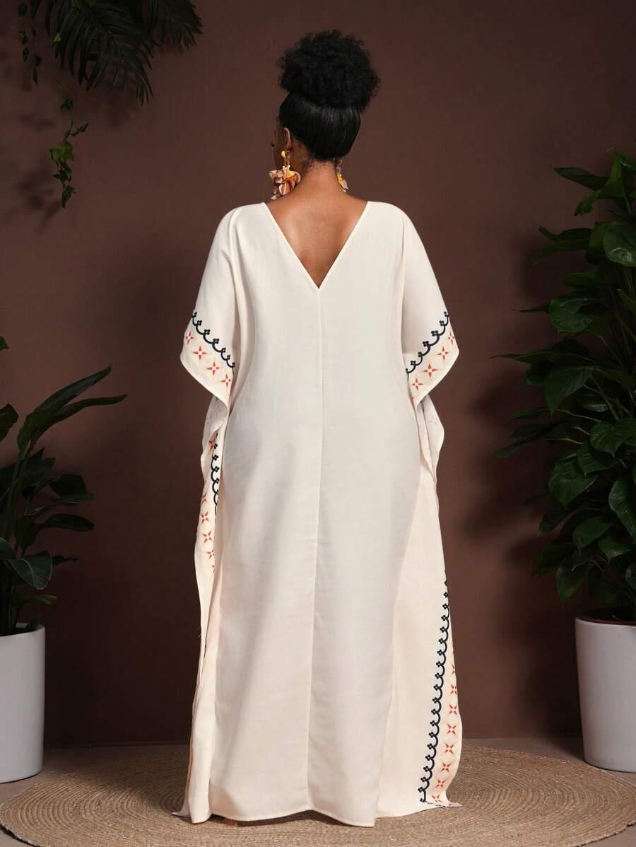 beżowa maxi sukienka v neck wzór 