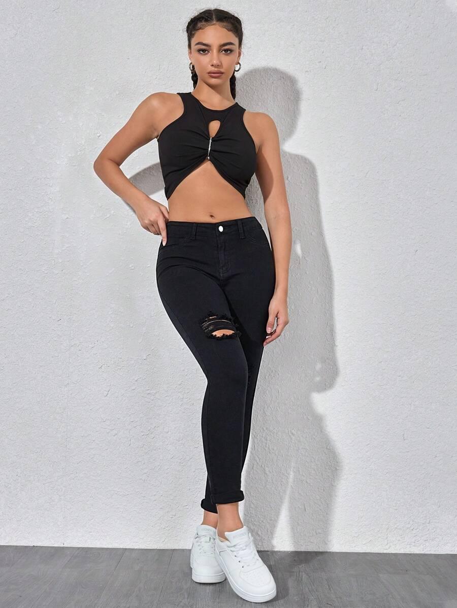 CZARNE SPODNIE JEANS PRZETARCIA 