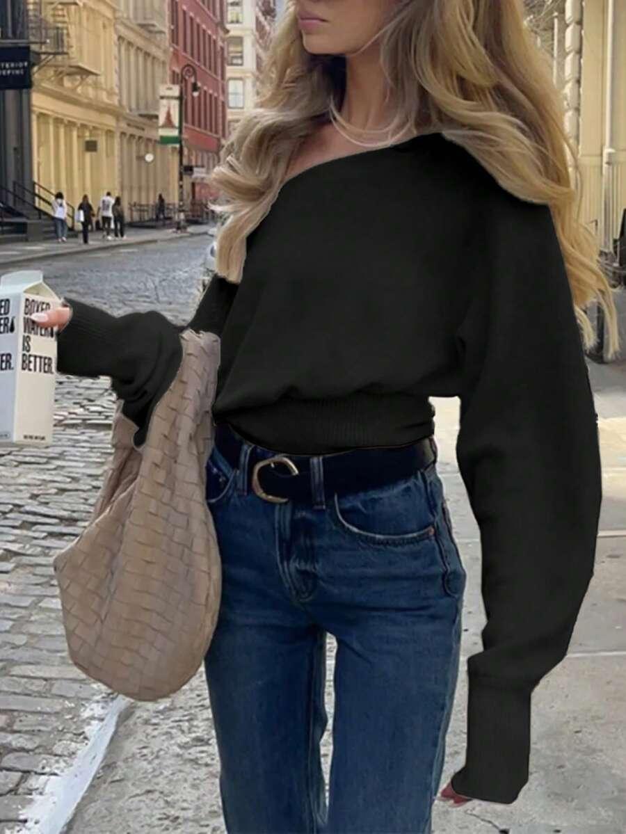 czarny sweter asymetria