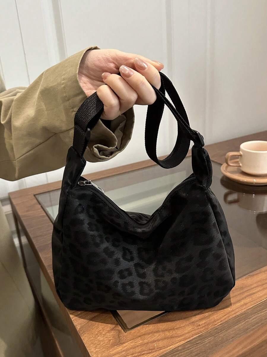 czarna torebka animal print
