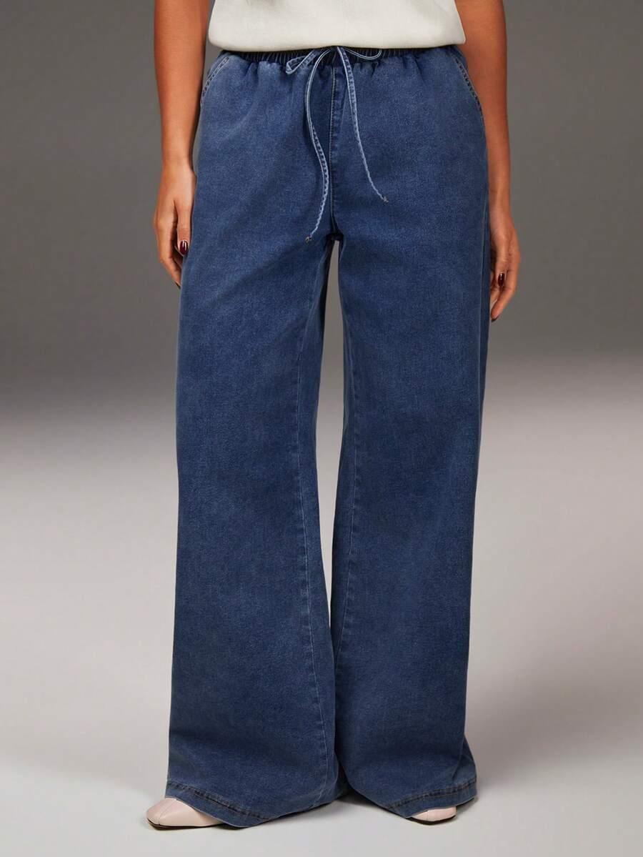 niebieskie spodnie jeans