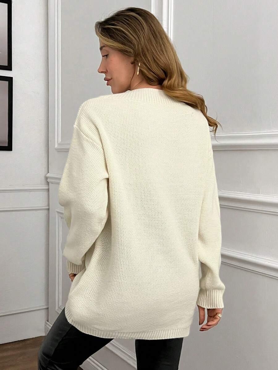 KREMOWY SWETER V-NECK