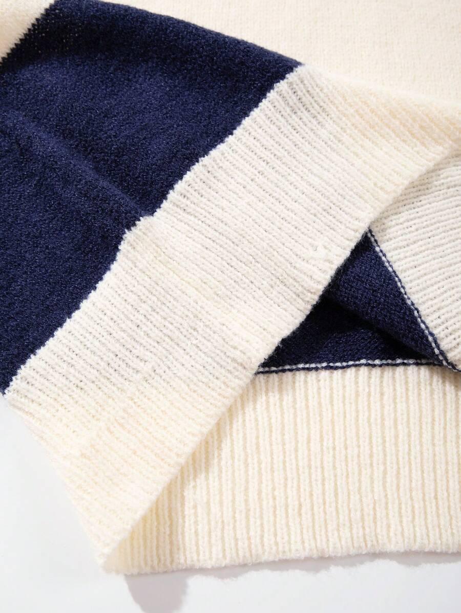 SWETER W PASKI