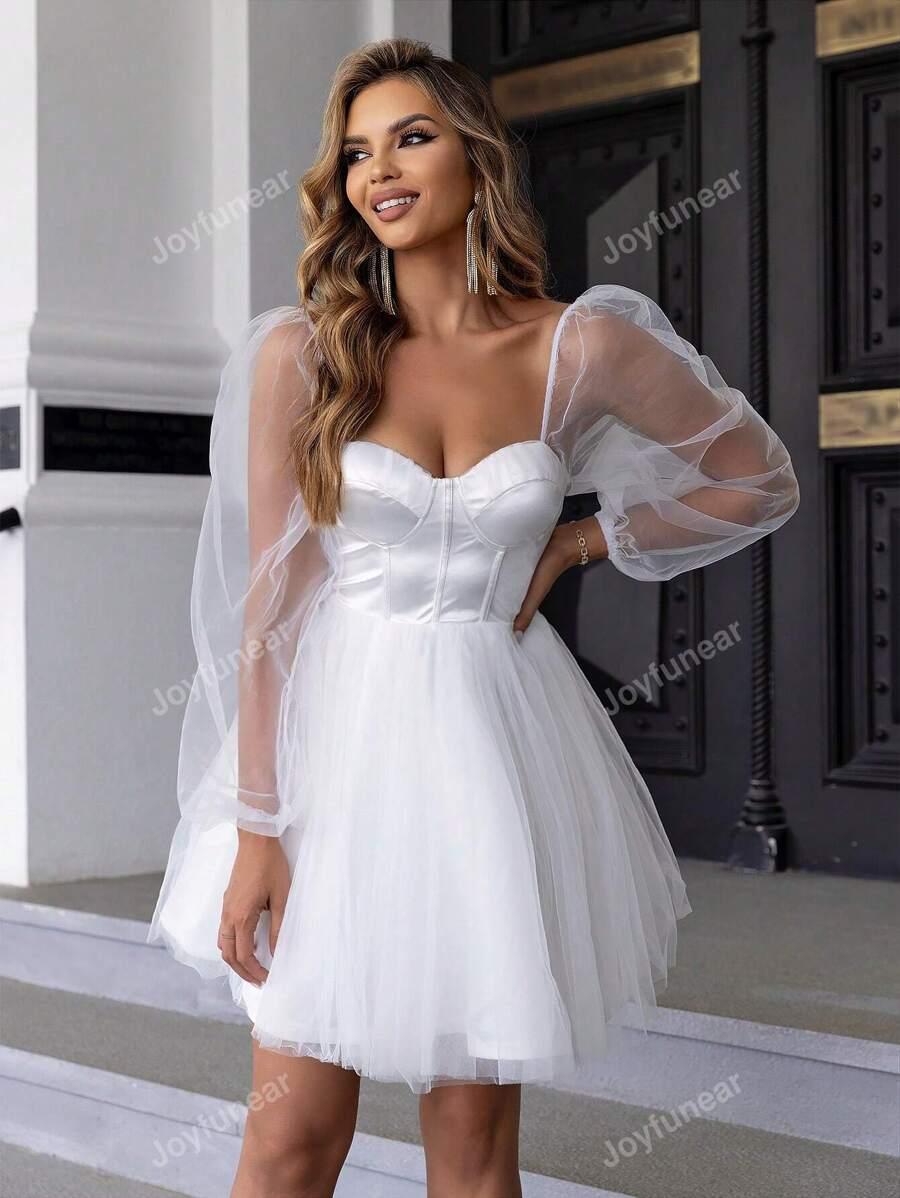 BIAŁA ROZKLOSZOWANA SUKIENKA ORGANZA