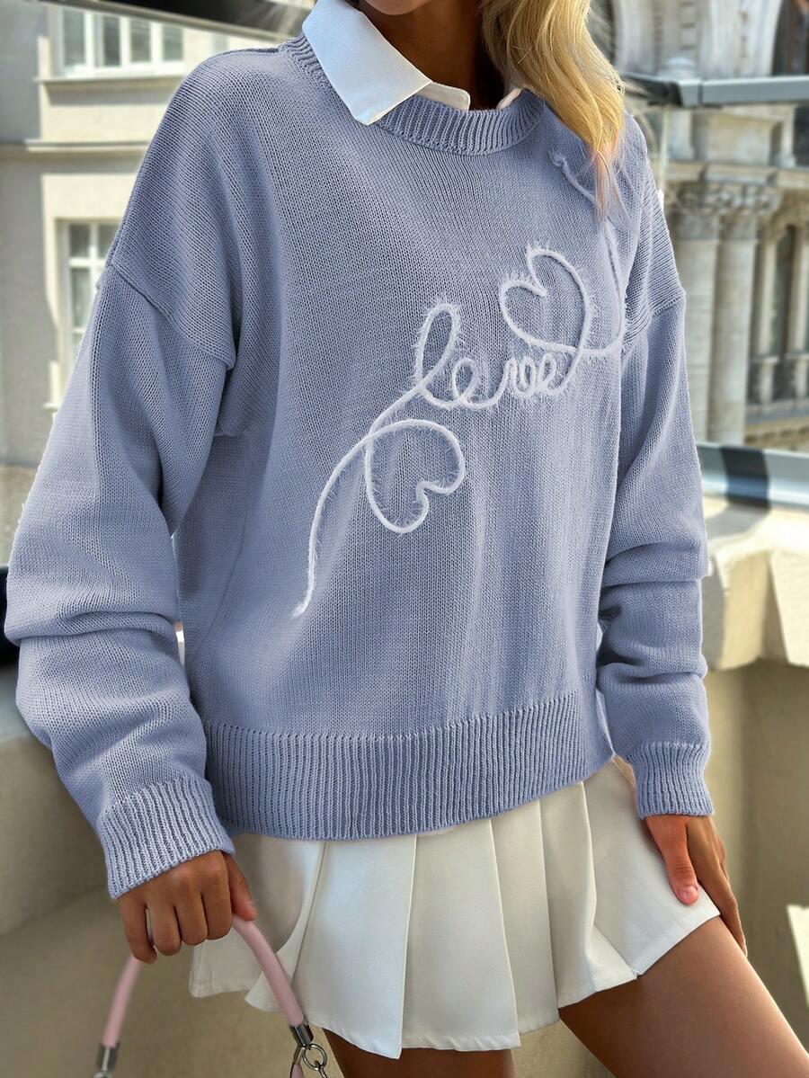 niebieski sweter okrągły dekolt