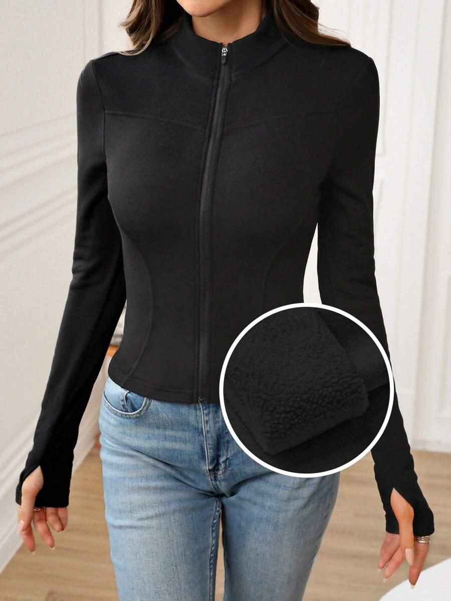 DOPASOWANA CZARNA BLUZA ZAMEK