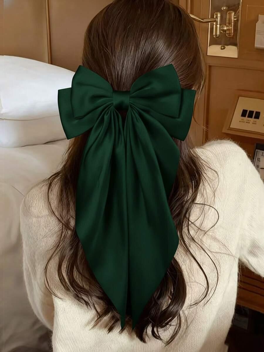 zielona spinka kokarda