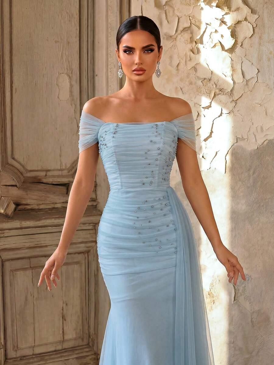 niebieska maxi sukienka zdobienie
