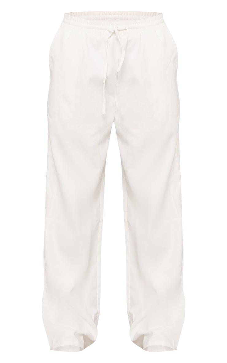 białe spodnie proste nogawki casual