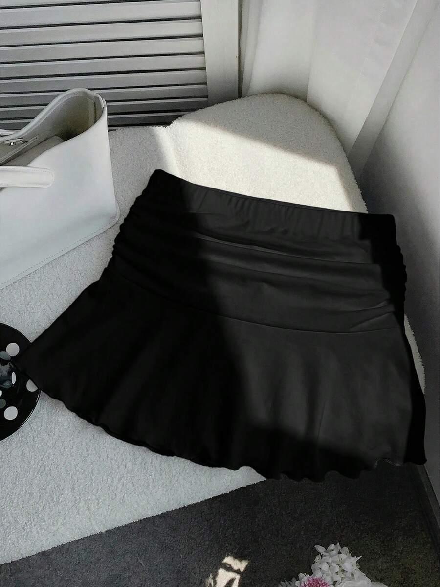 czarna mini spódnica falbana