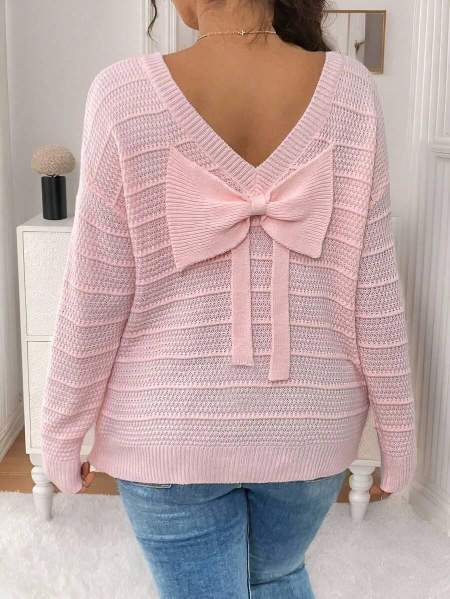 różowy sweter kokarda 
