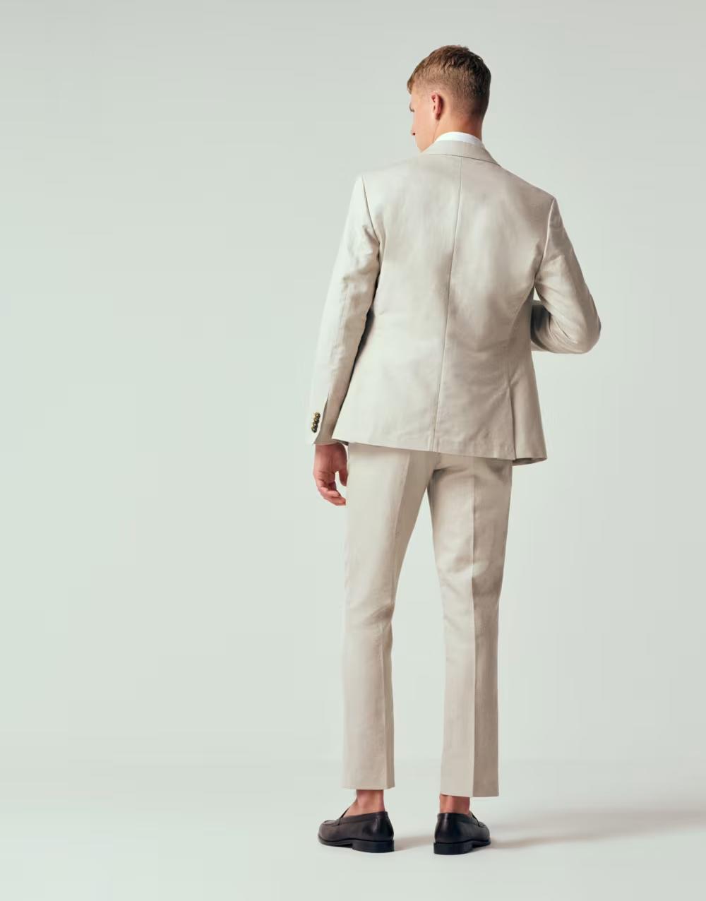 beżowe eleganckie spodnie kieszenie