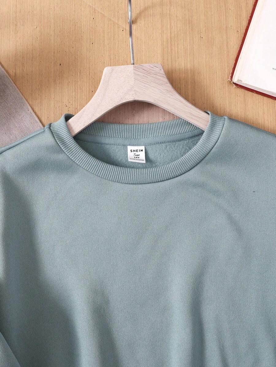 BLUZA DZIECIĘCA Z KOKADTKAMI NA RĘKAWACH