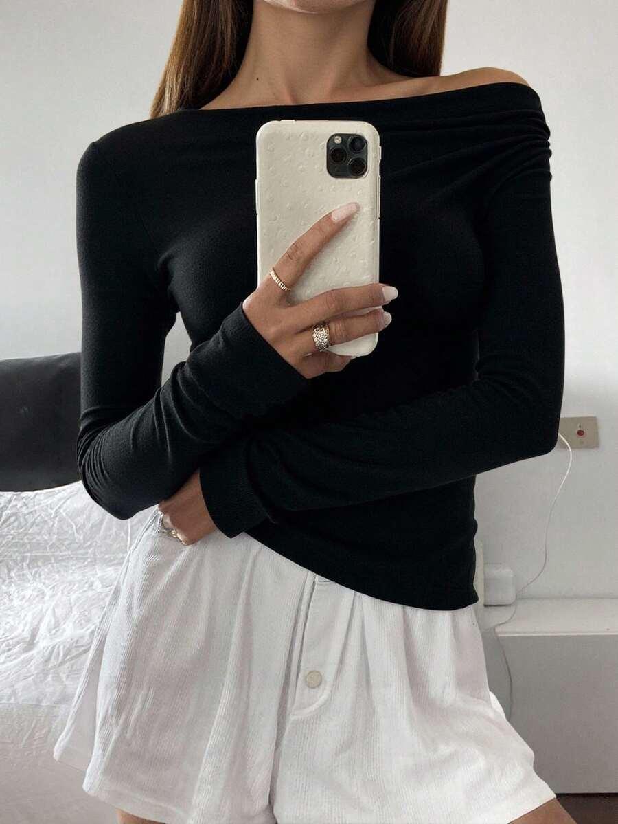czarna bluzka asymetria