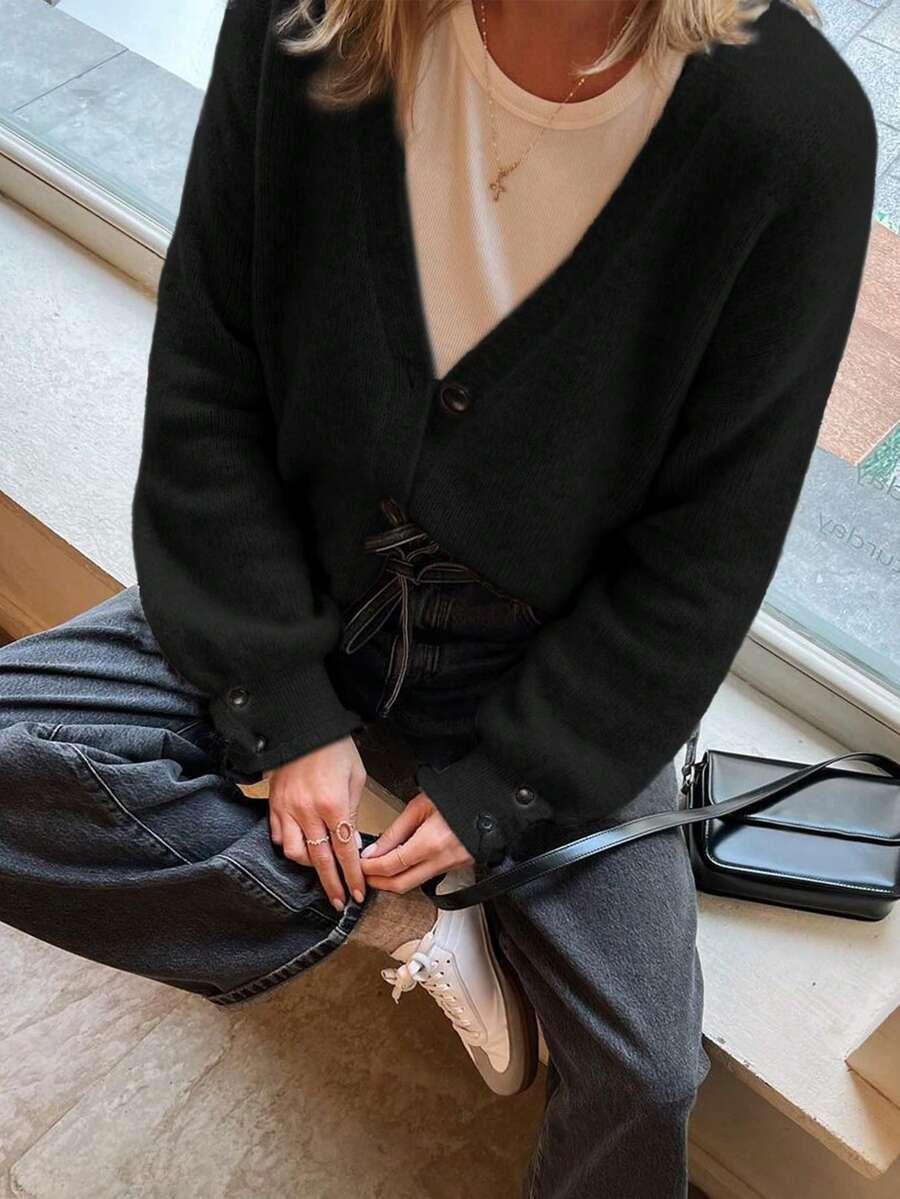 CZARNY SWETER GUZIKI