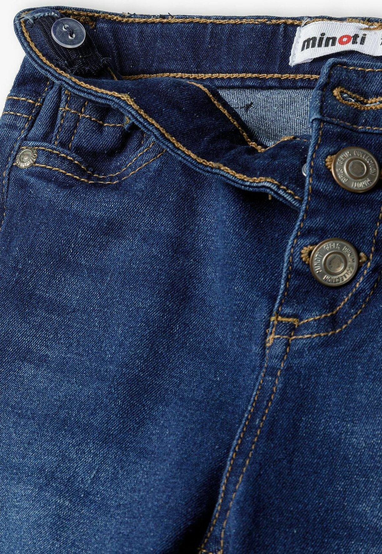 spodnie jeansowe rurki przetarcia 