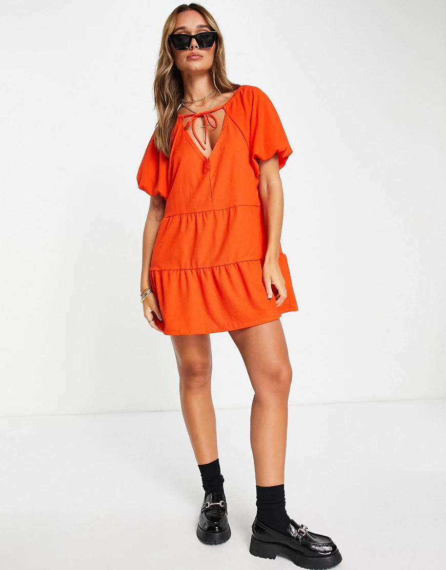 pomarańczowa mini sukienka krótki rękaw wiązanie