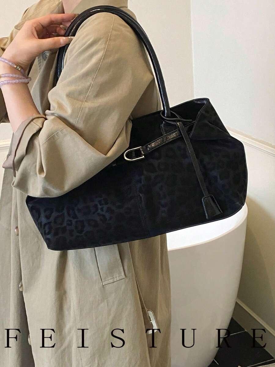 czarna torebka animal print