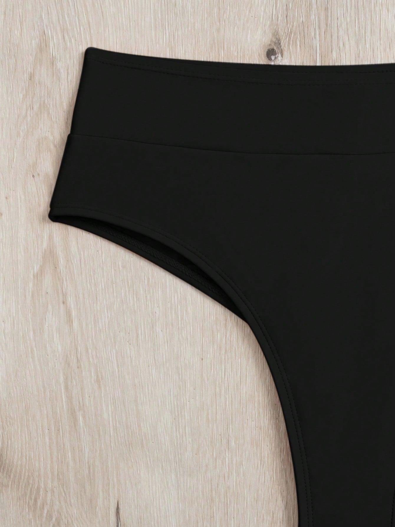 czarne stringi dół od bikini
