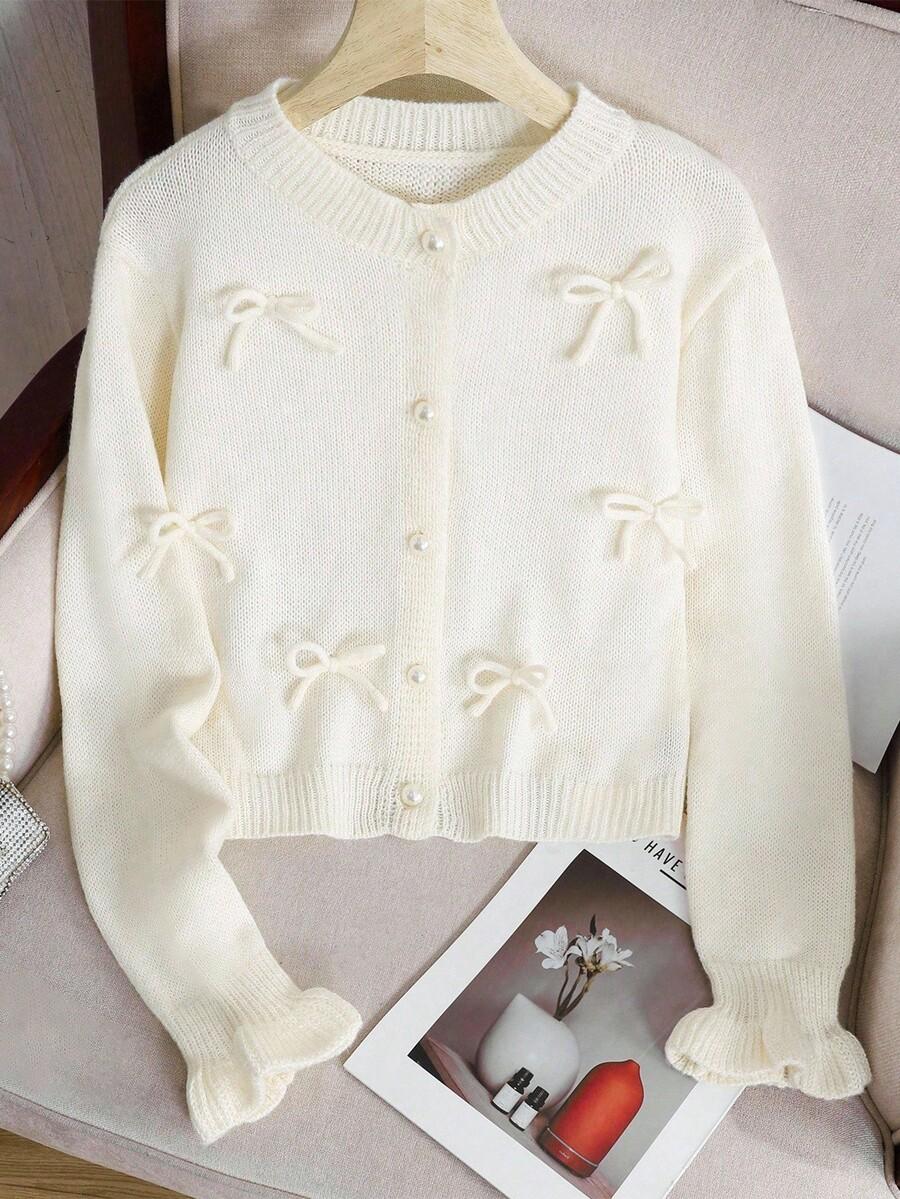 kremowy dzianinowy sweter