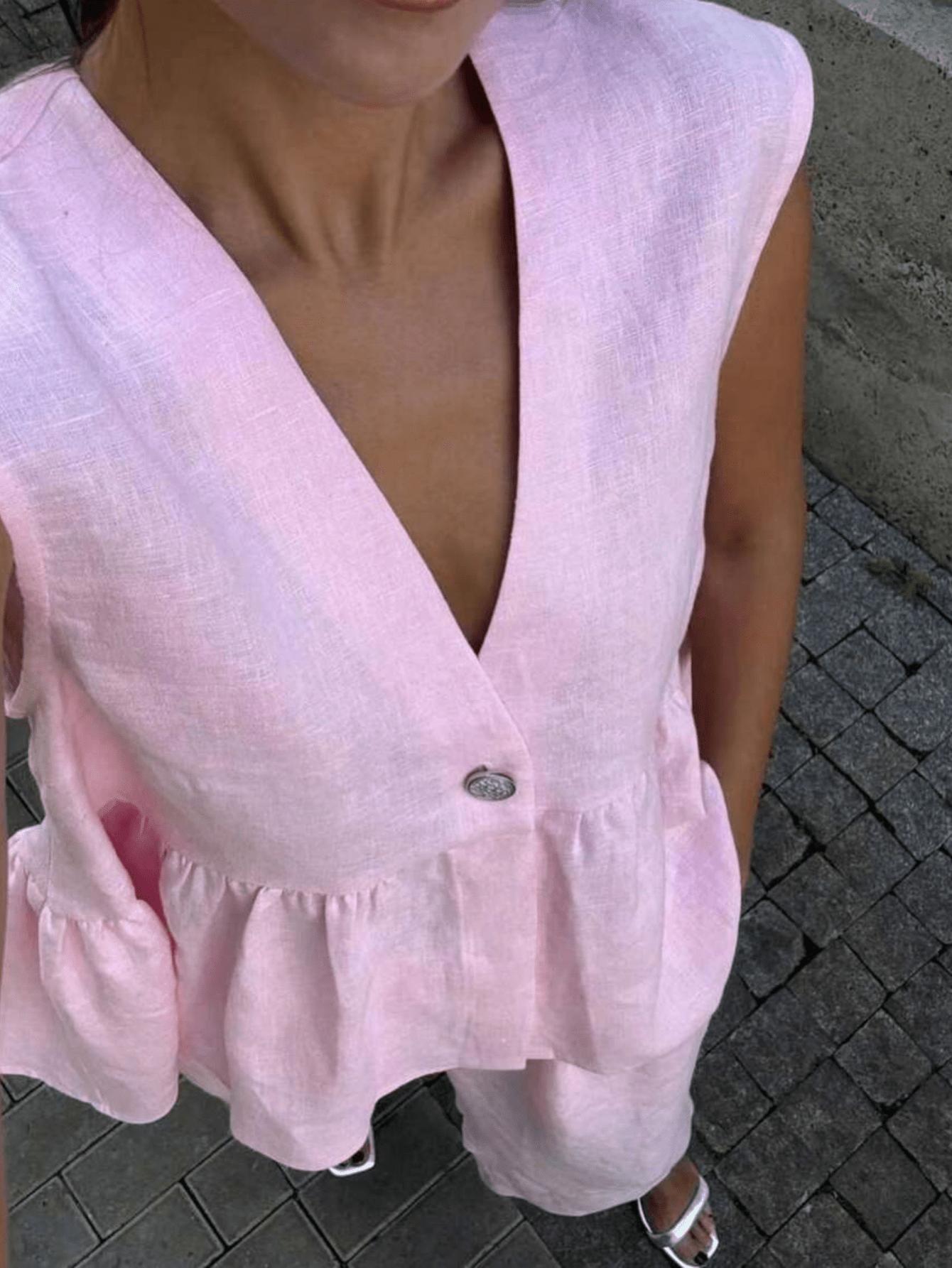 różowa bluzka bez rękawów v neck