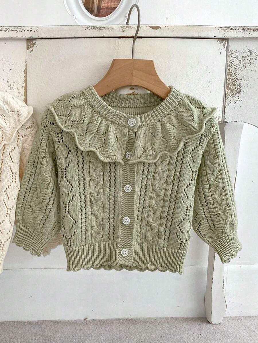 zielony sweter falbana 