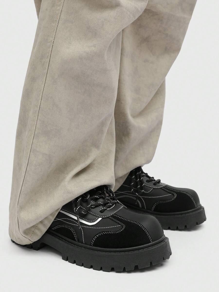 czarne sznurowane buty 