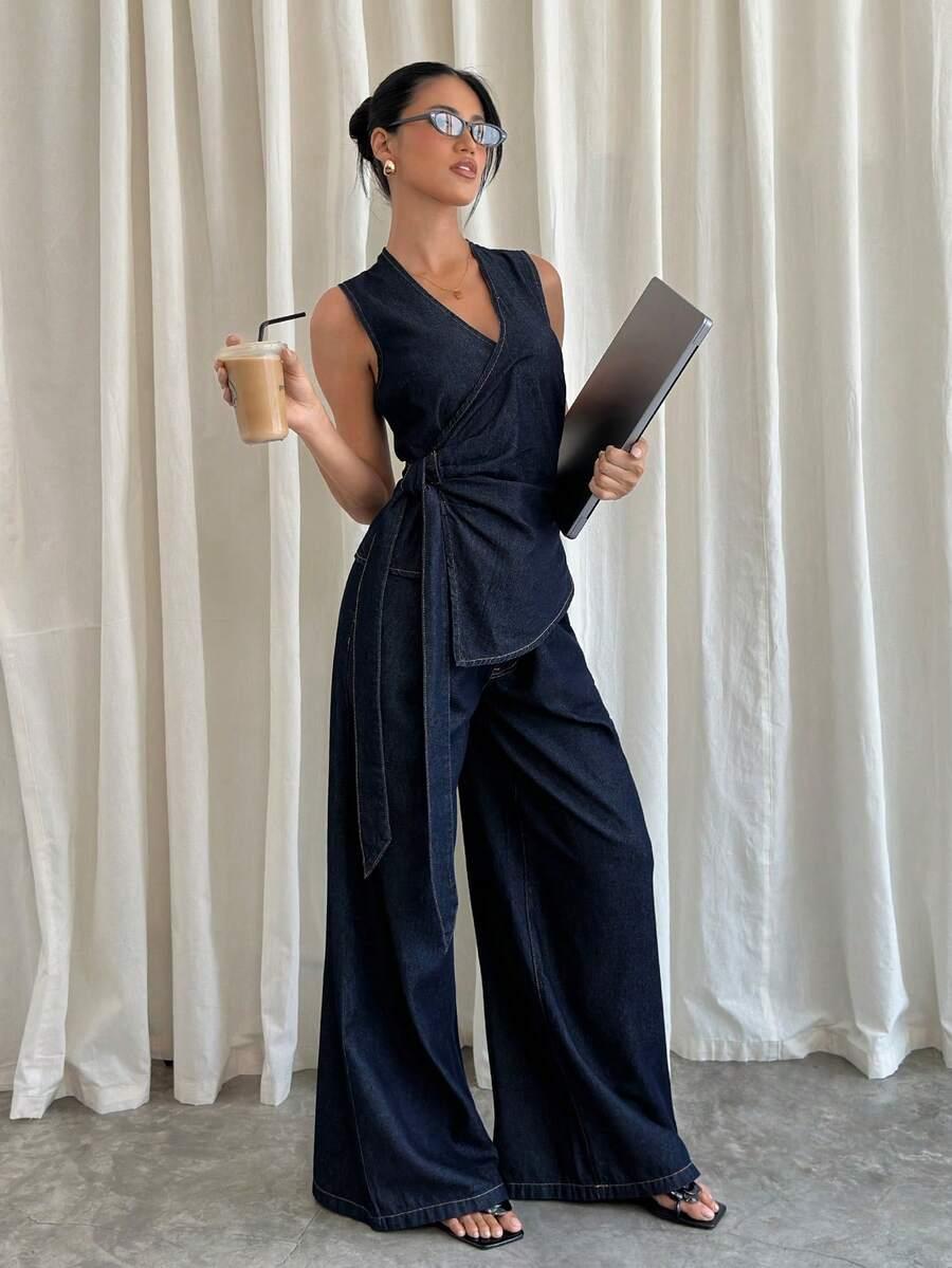 granatowy komplet bluzka spodnie jeans