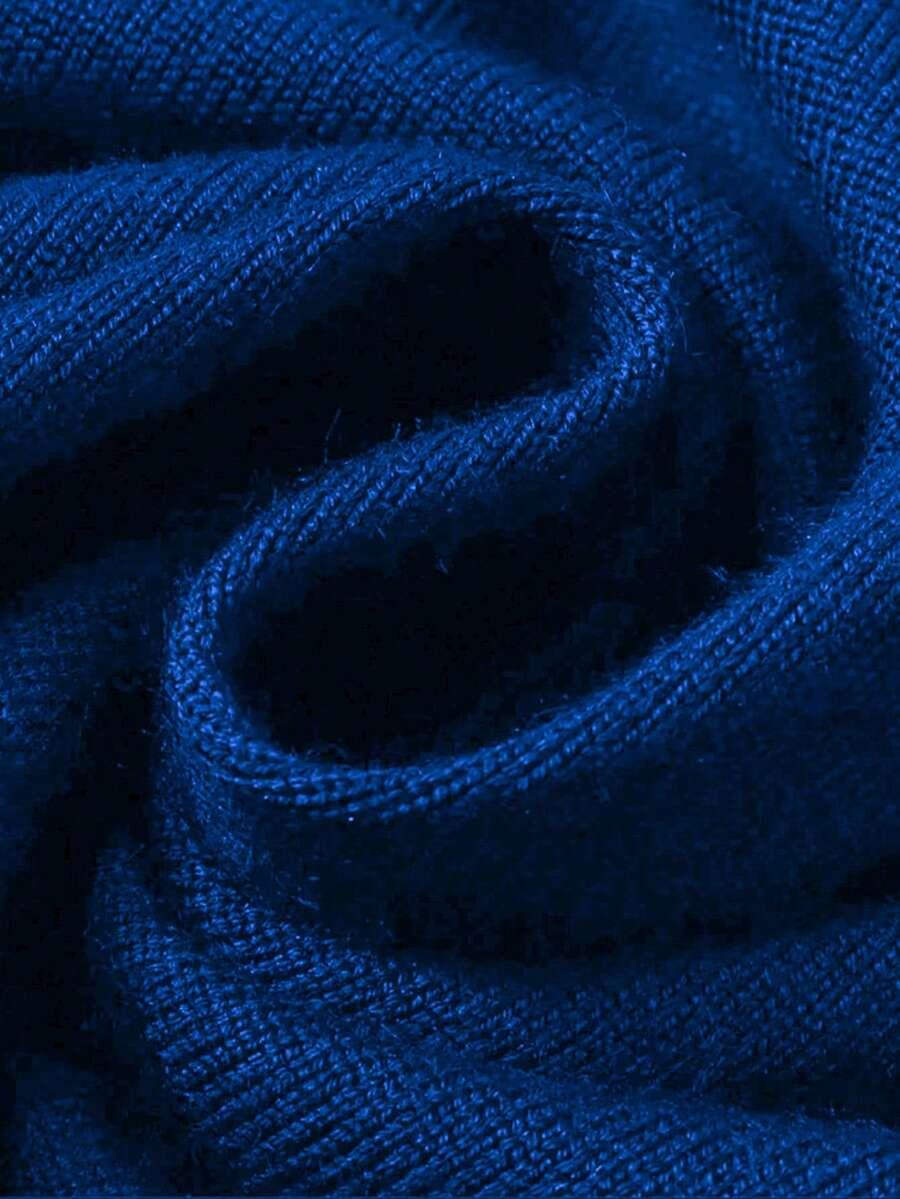 niebieski sweter golf