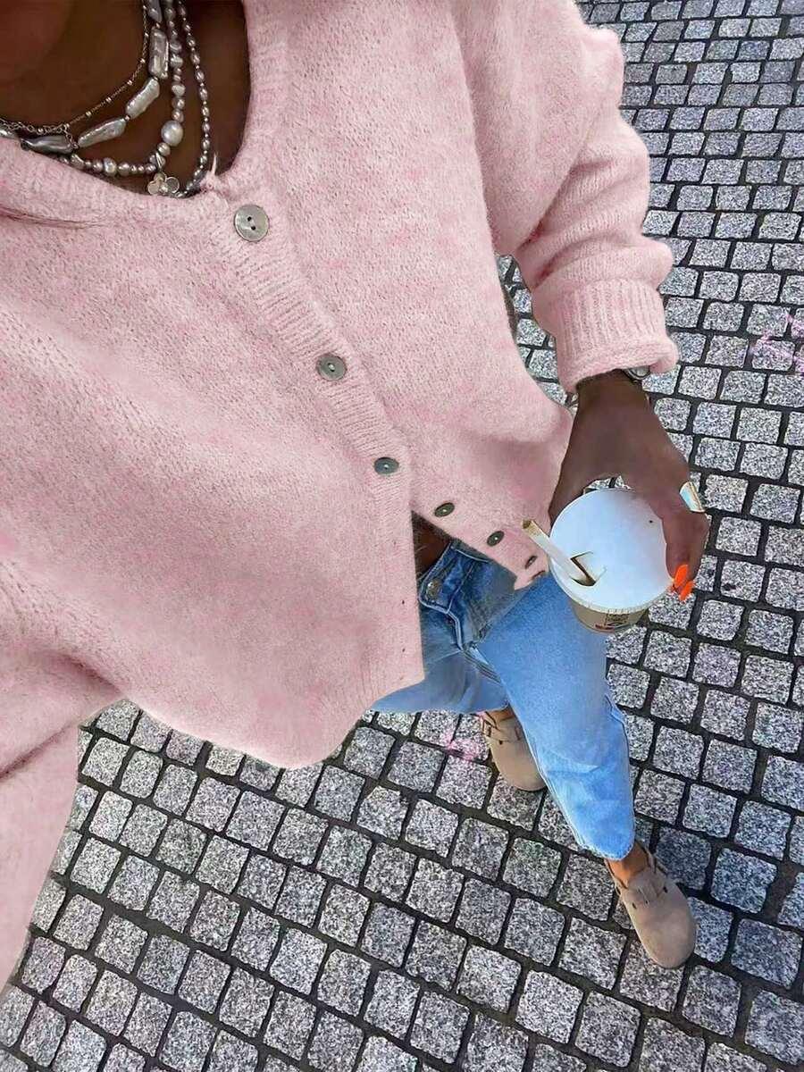różowy sweter guziki