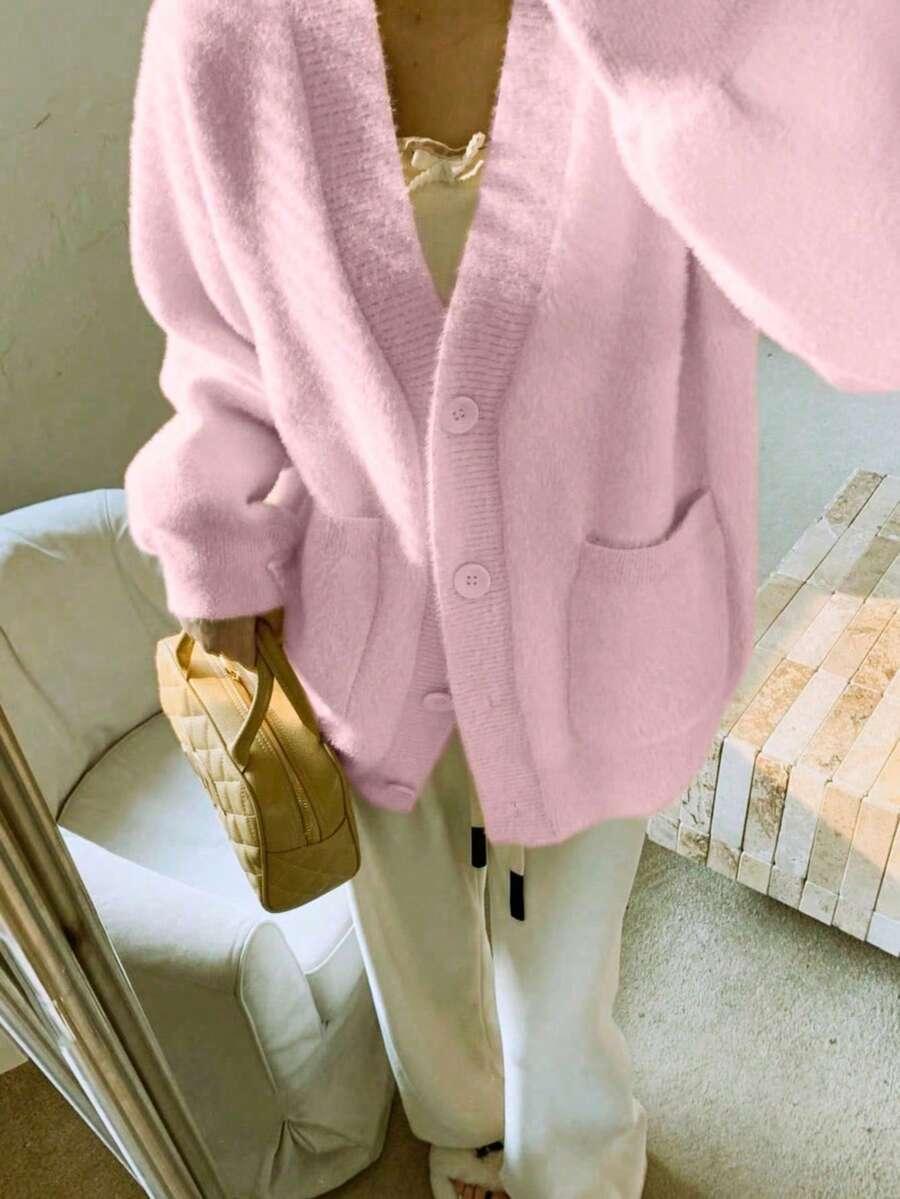 RÓŻOWY SWETER GUZIKI