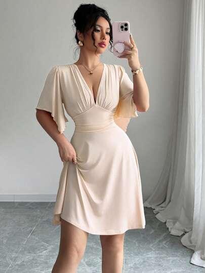 BEŻOWA SUKIENKA V-NECK