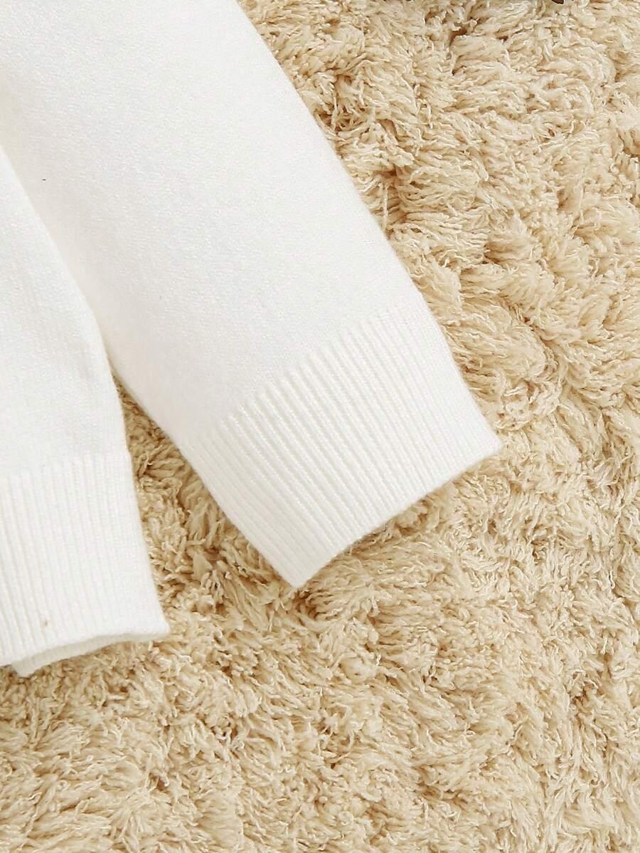 BIAŁY SWETER GOLF