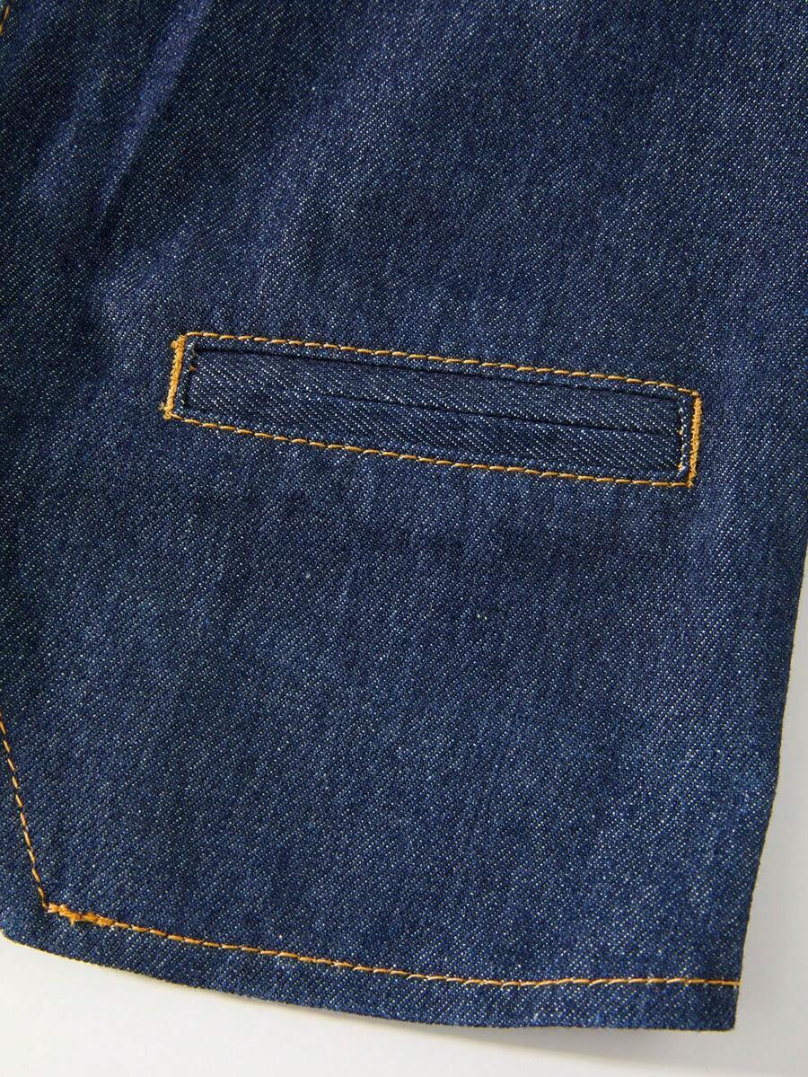 niebieska kamizelka jeans