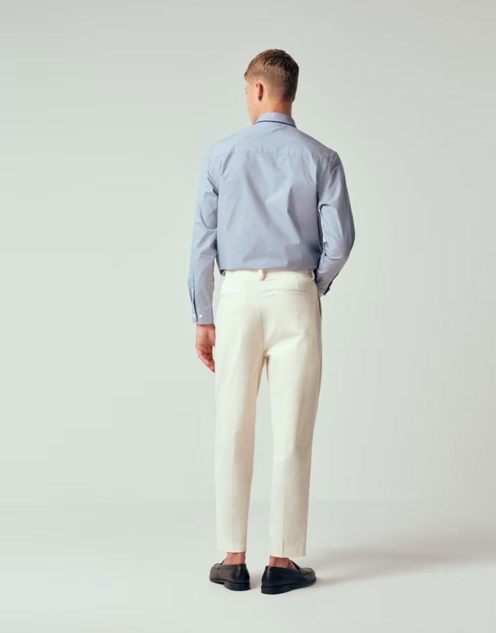 beżowe eleganckie spodnie kieszenie