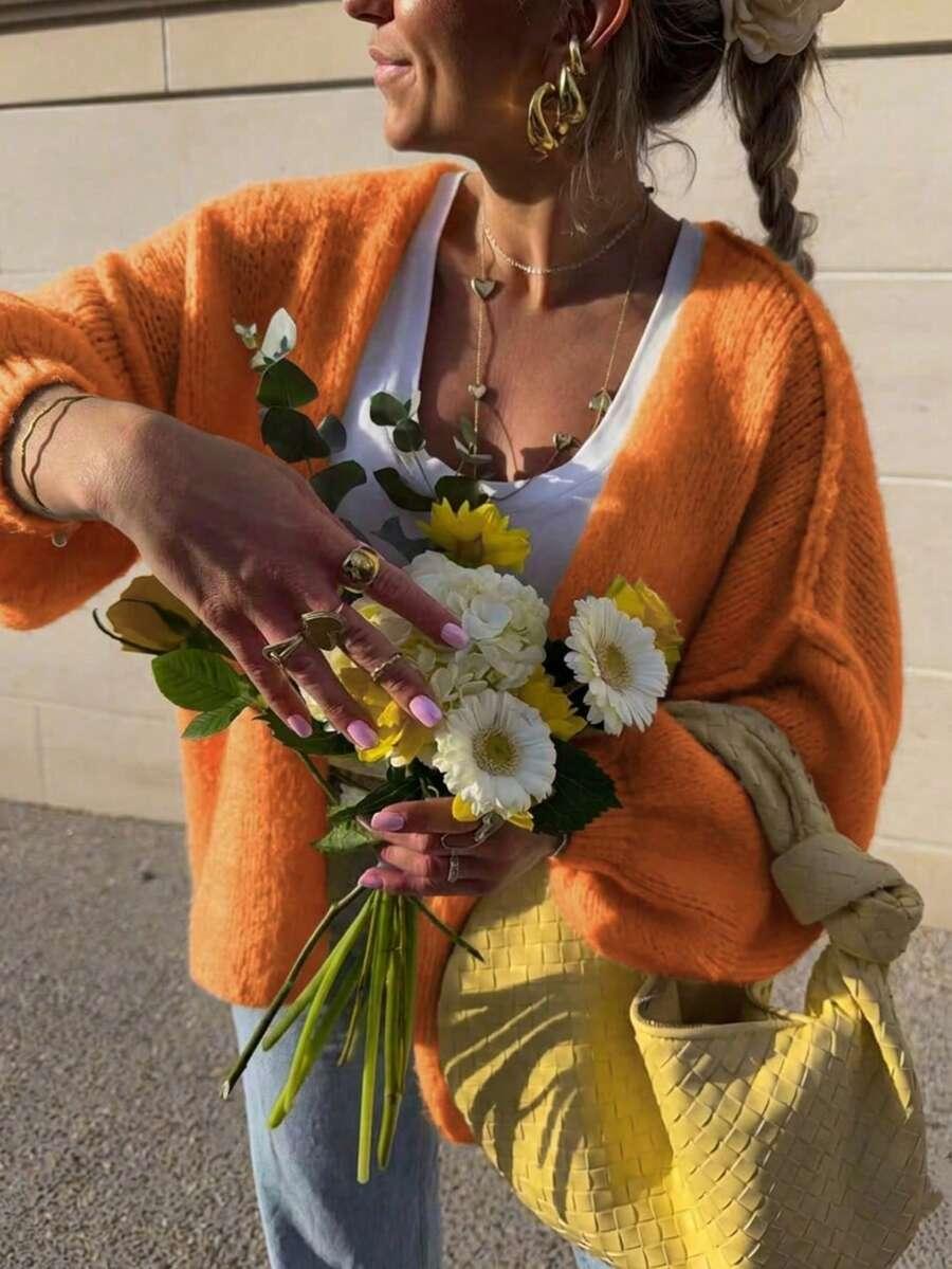 pomarańczowy sweter kardigan 